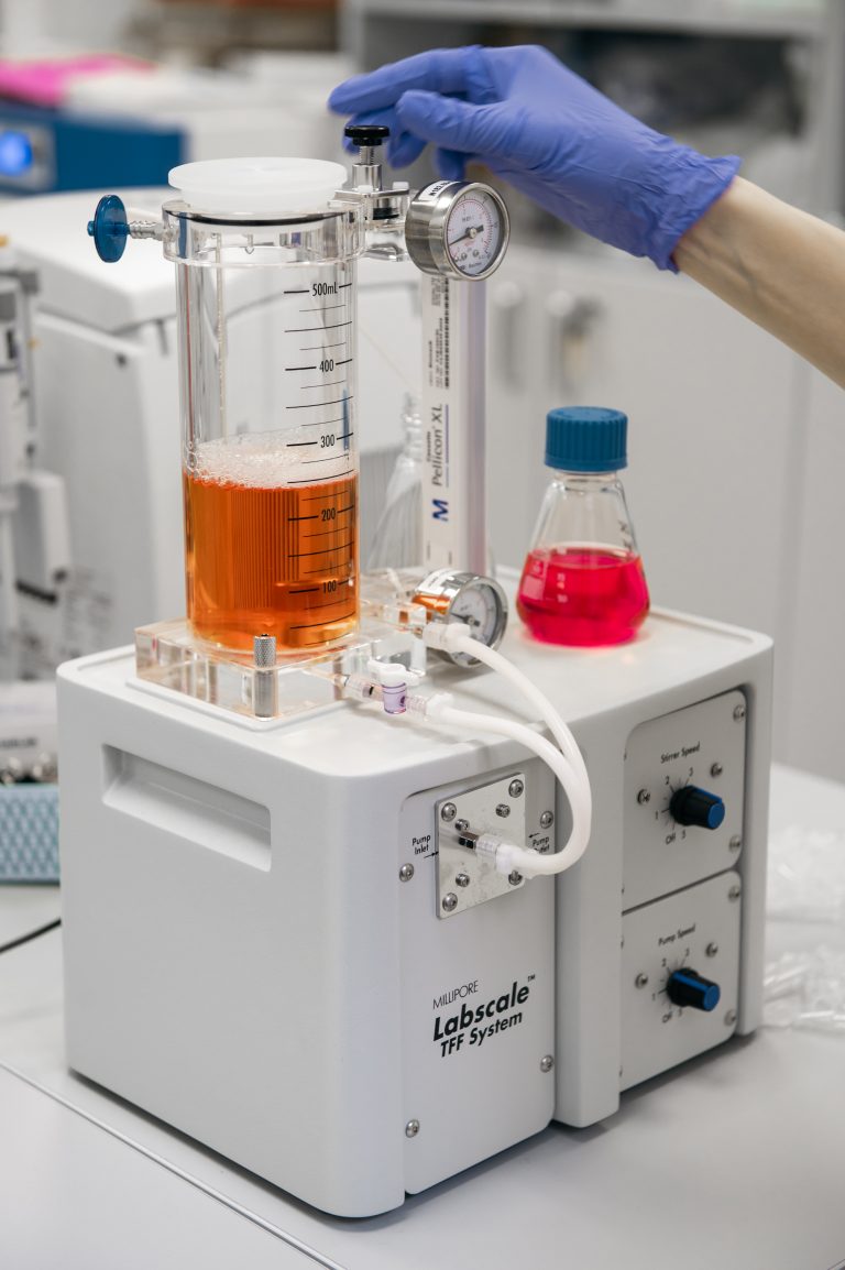 Tangential filtration system for concentrating cell-derivative solutions